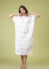 A Model Wearing White Upcycled Cotton Cloudwalker Kaftan , curated by Only Ethikal